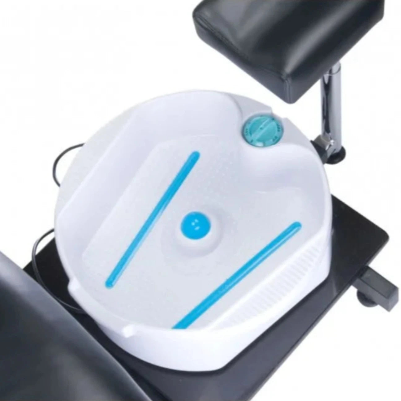 Foot bath setup in a beauty salon, featuring the massage foot basin and a neatly folded towel for a luxurious experience